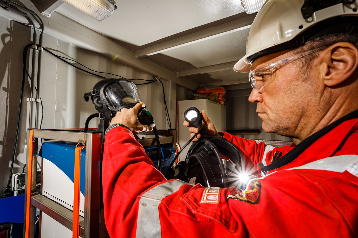 Service technician working in a mobile workshop